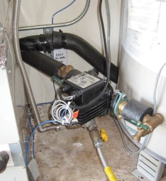 When possible, the author prefers to install the on-demand circulating pump at the water heater in a closed-loop configuration. The pump can be activated by any number of manual switches or motion detectors located near fixtures on the hot-water line.