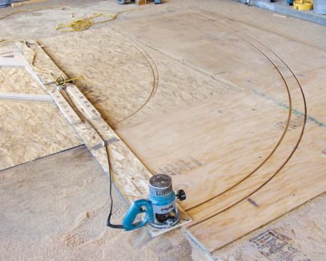 Cutting the plywood bottom plates for the walls that would enclose the stair.