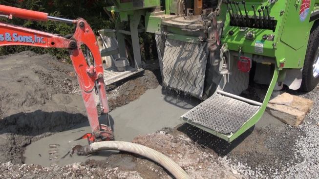 Some geothermal wells are dry, but some produce water. This well produced 100 gallons per minute of fresh water after the shaft reached the water table, requiring a pump setup to extract the excess water as drilling continued.