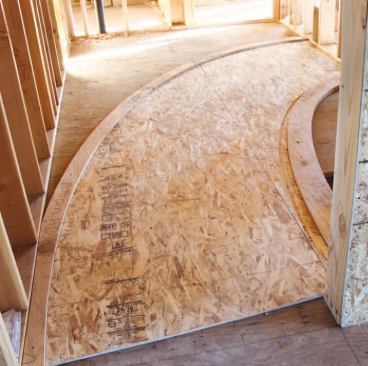 I set the OSB patterns in place in the stairwell, positioned the plywood plates, and transferred the tread locations from the OSB to the plates.