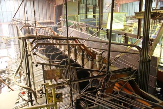 The saw contains a series of blades spaced 24 inches apart. The trimmerman decides which blades are up and which are down in the cutting position—and so, how long each piece will be. Like the sawyer and edgerman before him, he optimizes value by cutting around the worst defects and producing desirable length pieces.