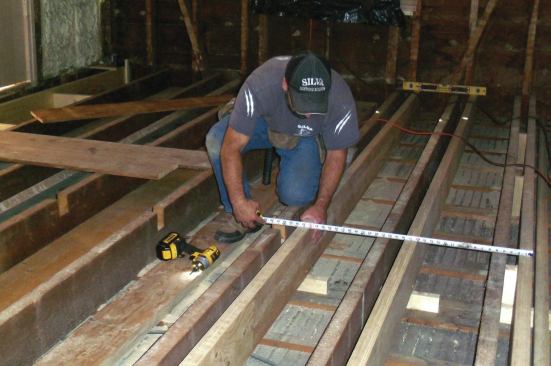 ... I pulled the layout for the joist and toe-screwed the joist to the block to lock it in place.