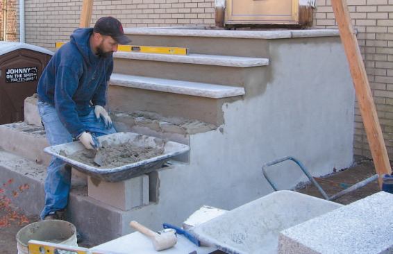 We replaced the original bluestone treads with 2-inch-thick by 12-inch-wide limestone treads, which cost less per lineal foot in our area ($13 vs. $9, including the rock-face treatment) and seem to adhere better to mortar.
