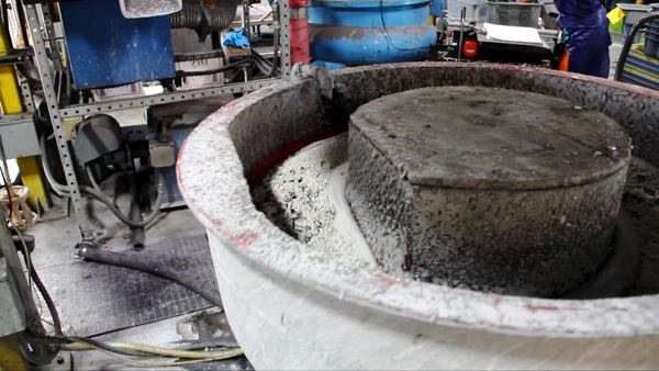 A magnet is used to remove the pieces from the slurry. After that they are rinsed clean or placed into a second tumbler for rinsing and polishing by a different type of ceramic pellet (
click here for video).