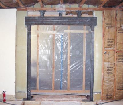 The columns bear on the floor trusses, which are reinforced with squash blocks.