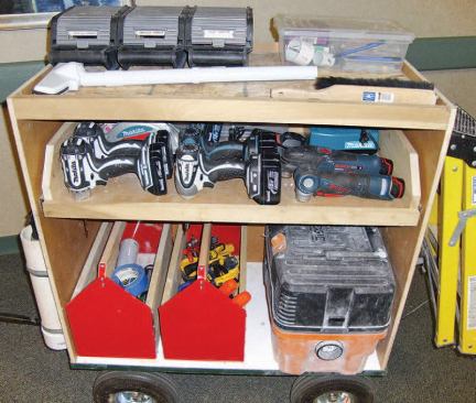 The cabinet wagon had a full-extension drawer containing a half-dozen cordless tools and their chargers and accessories. A number of drill/drivers were set up with different bits to save the time that would otherwise be spent in changing bits for different installation tasks.