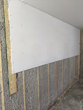 With the backer board positioned between framing members, the butt end of a sheet of drywall will be pulled in slightly when both panels of the butt joint are secured.