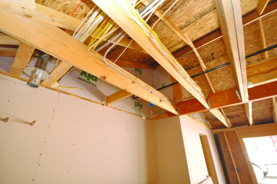 However, it proves to be an excellent backer for airsealing above the rim joist to the roofline. The reverse side of this sheathing was later insulated with 6 inches of closedcell foam.
