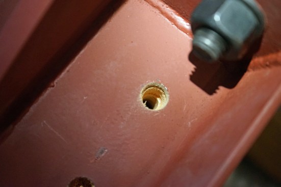 ach bracket required 20 lag screws, and each hole for the lag screws was predrilled using two different drill bits—one sized for the threaded shank and one for the shoulder of the lag.