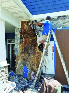 No solid sheathing was present on the entire section of the wall.