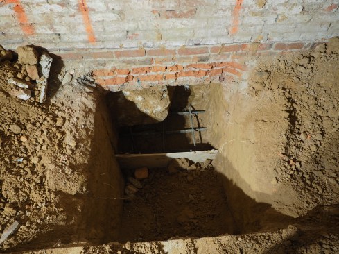 Each excavation pit gets a rebar cage before the foting is poured.