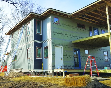 On this project, Celect cellular PVC cladding is installed over Slicker, which provides omni-directional drainage and drying over the entire wall.