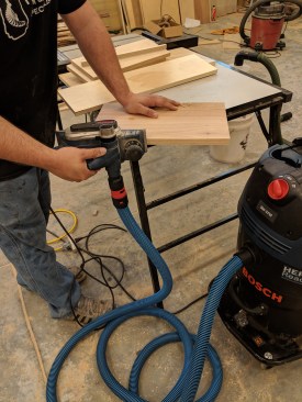 No matter what tool the author used the extractor with—a big chip maker like the planer here or a fine-dust creator like a sander—the auto-clean function kept the filters nearly spotless.