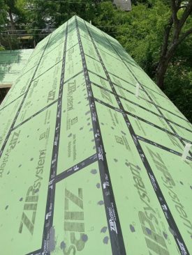 The author also uses tape on the expanse of the roof.
