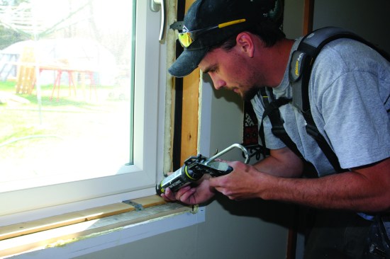 Complete the air seal by caulking in the corner between the backdam and the window.