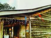 Buildings Don’t Lie is peppered with picture quizzes. This one points to the siding under the eaves of the porch (blue arrow) and asks why it is more weathered than the siding on the main house (red arrow). No spoilers here; you’ll have to buy the book.