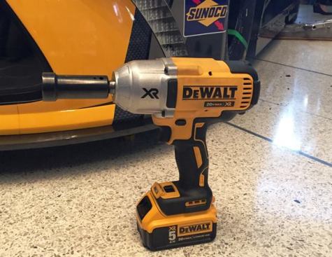 The ½-inch detent pin anvil model (DCF899; also available with ½-inch hog ring) is one of three new heavy duty brushless impact wrenches from DeWalt. I photographed it in front of a NASCAR vehicle because it was used in a demonstration by a professional pit crew. While the tool isn’t fast enough for use by a pit crew (they use custom-built air tools that run 16,000 rpm) it’s up to whatever a mechanic might throw at it. The other models in the series have a ¾-inch hog ring (DCF898) and 7/16-inch quick release chuck (DCF897). The quick release chuck is favored by utility crews—and the quick release model has a ring on top from which the tool can be hung.