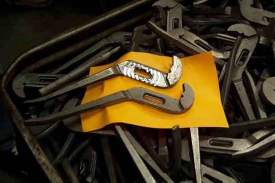 The angled grooves in these tongue and groove pliers would be impossible to form with a forging process.