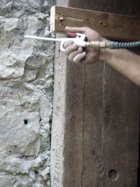 To ensure a good bond, the author cleaned the hole with compressed air.