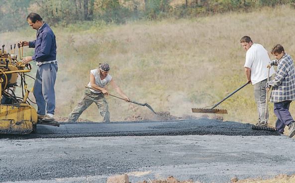 The hot asphalt is placed.
