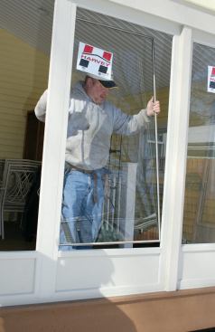 Finally, depending on the season, we install the glass or screens in the panels.