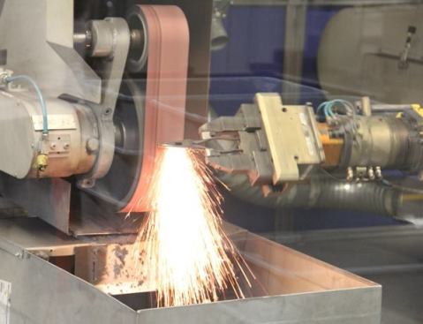 A pair of long-nose pliers is being manipulated by a computer-controlled robot capable of picking up tools and grinding them to shape with various grits of abrasive belt (
click here for video).