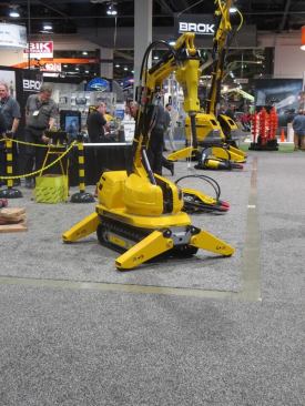 This is the
Brokk 60, a remote controlled demolition machine that beats the heck out of using a hand-held breaker.