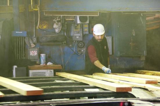 Grading is the final step before the lumber leaves this particular building. The grader takes a quick look at each board and puts a grade mark on it in chalk (
video here). This is another highly skilled job. My tour guide pointed at a board that to this carpenter’s eyes looked perfectly normal and said “See this cross-grain crack? That’s why it’s a lower grade”. I looked again and could barely see it. He said the grader can easily see that kind of defect—it’s a gimme.