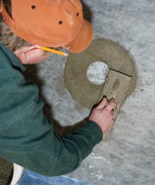 Finally, I filled the depression around the strainer with cement mortar — I use the bag form of Laticrete 3701.