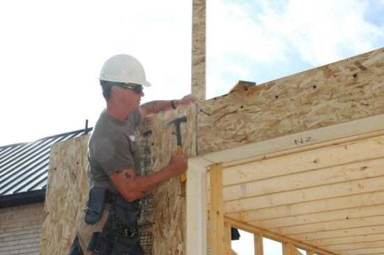 Panel splines are nailed into place at the panel joint using 8-penny nails.