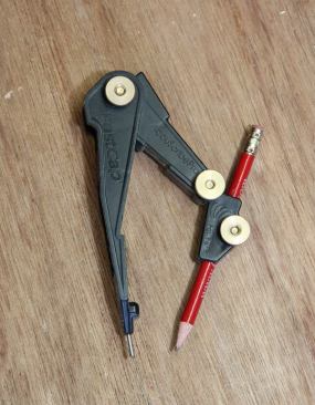 FastCap AcuScribe Pro We regularly scribe trim to walls and floors: base moldings, cabinets, shelving, and the like. For this kind of work reliable scribes are a must, and the AccuScribes have many cool features. The side across from the pencil is flat, which provides some stability as you run it across the surface you are scribing to. These scribes are more adjustable than most because there are two pivot points, one in the usual location and another just above the pencil. The built-in pencil sharpener (next to the main pivot) is also quite handy.