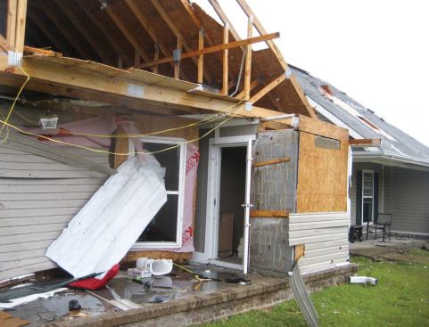 The home's masonry safe room, at the front center, was undamaged, and may have helped strengthen the home against the tornado's forces.
