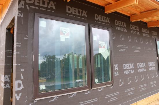 My Andersen 100 Series windows are looking good with this black house wrap!