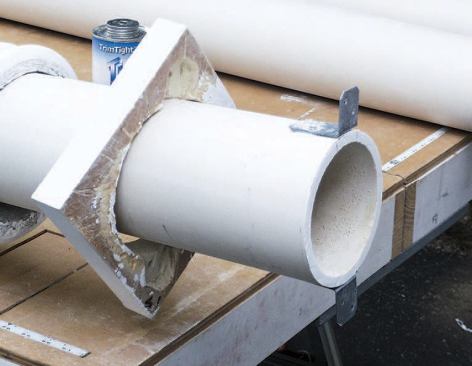 Metal framing anchors screwed to the column provide a strong connection to the pedestal.