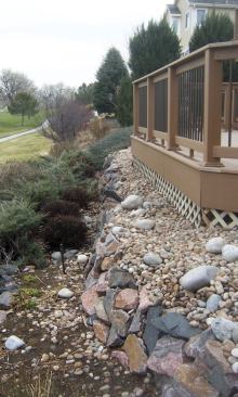 In previous editions of the code, rails would not have been required on this deck — even though there’s an obvious fall hazard — because the grade directly next to the deck was less than 30 inches below the decking.