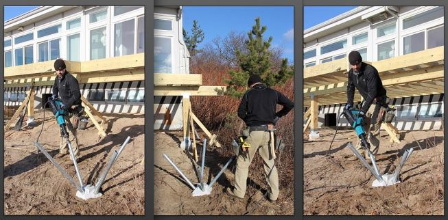 Using an electric jackhammer with a specially designed bit that fits over the Diamond Pier pins, Horgan works his way around the hub and drives the pins into the earth in stages. Driving the pins takes about five minutes.