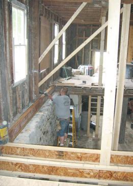 This approach allowed reframing of the floors to proceed in sections.