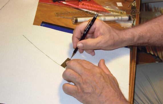 Make a Paper Pattern: To draw the parallel line representing the outside edge of the return, I use a paper gauge to make a series of points 13/ 8 inches away from the original line, then connect the points with the French curve. (The 1 3/ 8-inch width gives me room for a 5/8-inch cove or scotia molding, without impinging on the bullnose.)