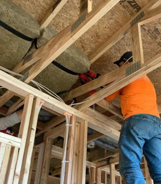 The truss-frame underroof was insulated with R-38 stone wool batts, resulting in a nominal R-58 for the lid of the home. Combined with the rigorous air barrier, the assembly avoids any condensation risk.