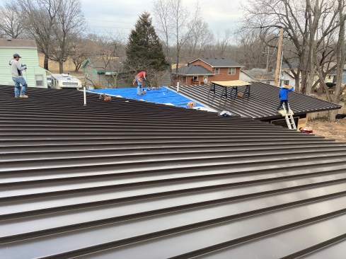 The author uses commodity OSB to sheathe the overroof. Once covered with a peel-and-stick synthetic underlayment and metal roofing, the assembly is sound.