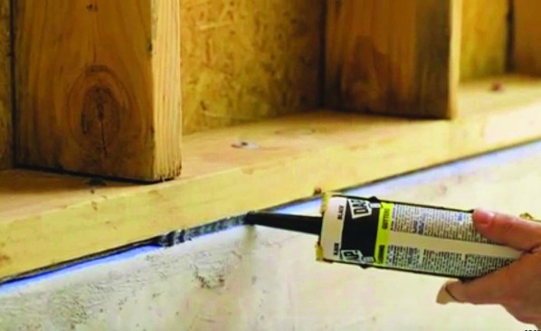 Seal along the base of the wall between the concrete and the bottom plate with more than the standard foam sill seal.