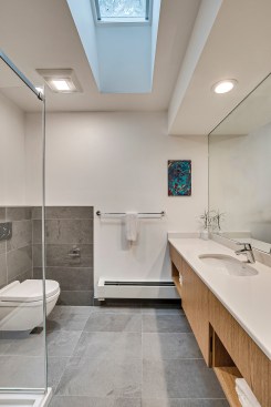 Placing heaters above the tile baseboard makes for easier floor cleaning.
