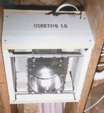 A conventional recessed can fixture can be installed in a site-built foam box. The box, which is sized to provide 2 inches of free air on all sides of the fixture, is assembled with Tremco to seal the seams.