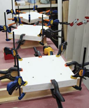 The caps and bases are laminated out of two pieces of 3/4-inch PVC.