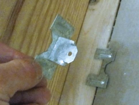 Drywall clips replace lumber backers in wall and ceiling corners.