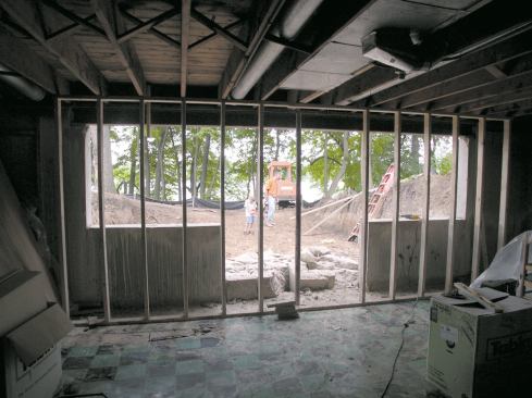 Supporting the home's brick veneer while cutting through the concrete foundation required careful planning and good temporary support.