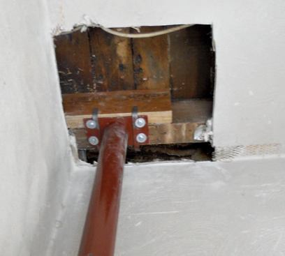 Solid blocking transfers the loads through the floor framing.