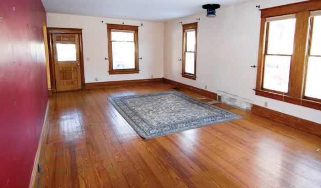 The author began by removing the original flooring.