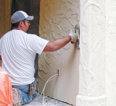 Most EIF systems have a smooth and uniform finish coat, but this home was given a deeply textured finish coat to match the Mediterranean architecture.