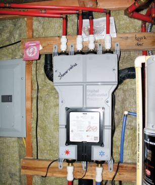 Water is distributed to the showerheads via a digitally controlled shower valve in the basement.